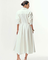 Robe chemise blanche classique avec détails de poche et jupe complète personnalisable OEM/ODM fabriquée au Vietnam