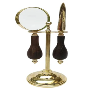 Brass desk set featuring a <b>magnifying</b> <b>glass</b> and letter opener, both held <b>on</b> a central <b>standing</b> display Available at wholesales - Product Image 1