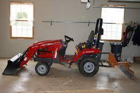 Cargador de tractor de ruedas Massey Ferguson GC2400 4x4 usado barato con quitanieves de montaje frontal y plataforma de corte de montaje medio, la mejor calidad - Product Image 3