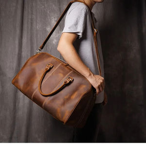 2025 nueva tendencia bolsa de lona de viaje redonda grande multifuncional impermeable cuero genuino estilo de moda moderno - Product Image 4