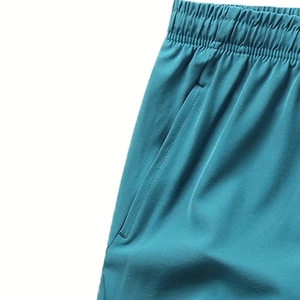 Shorts de sport pour homme à taille mi-haute, couleur unie, séchage rapide, légers, respirants, pour l'entraînement, la course et le fitness, avec taille élastique - Product Image 3