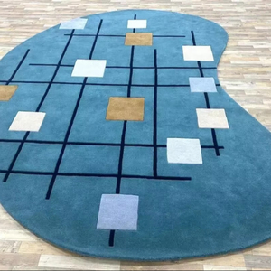 Juego de alfombras geométricas azules abstractas modernas contemporáneas Alfombra curvada con diseño azul y geométrico - Product Image 1