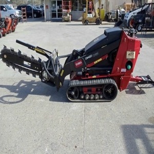 Mini-chargeuse sur chenilles Toro TX427, moteur diesel, avec godet de 0,45 m et accessoire brosse pour le défrichement des terres agricoles, neuve - Product Image 1