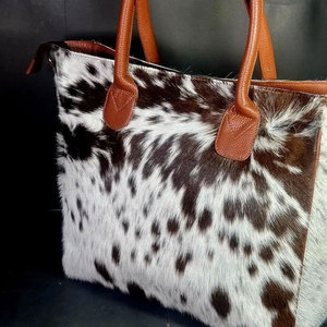 กระเป๋าถือหนังวัวแท้สั่งทำแบบขายส่ง คุณภาพสูง พิมพ์โลโก้ตามสั่ง - Product Image 3