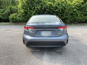 Hybrid LE FWD 4 portes 2024 d'occasion, état impeccable, sièges en tissu, moteur hybride, transmission automatique, Bluetooth, conduite à gauche, couleur foncée - Product Image 6
