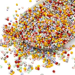 Venta al por mayor a granel 10 tonos vibrantes cuentas de vidrio a rayas de arco iris cristal redondo Murano 1mm Tamaño del agujero para la fabricación de joyas y manualidades - Product Image 1