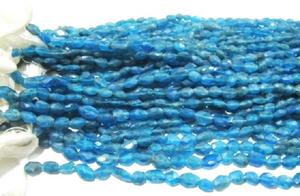 ลูกปัดอพาไทต์สีน้ำเงินนีออนแท้ธรรมชาติ ทรงรีเจียระไน ขนาดประมาณ 4x6 มม. - Product Image 3