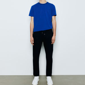 Vente en gros de vêtements d'été pour enfants de haute qualité T-shirt à manches courtes 100% coton Streetwear tricoté respirant avec logo personnalisé - Product Image 5