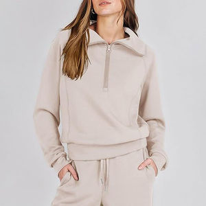 Conjunto deportivo de dos piezas para mujer, diseño moderno, color beige, con sudadera con capucha y pantalones de chándal de largo completo. - Product Image 2