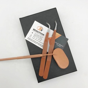 High Quality Custom Logo Stainless Steel Eyelash Tweezers Sustainable with <b>Pointed</b> Tip Hand-Tested Brown Color - Product Image 1