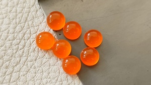 พลอยคาร์เนเลียนสีส้มธรรมชาติทรงกลมเรียบแบบคาโบชอง ขนาดสั่งตัดได้ สำหรับทำเครื่องประดับ แบบหลังแบน - Product Image 3