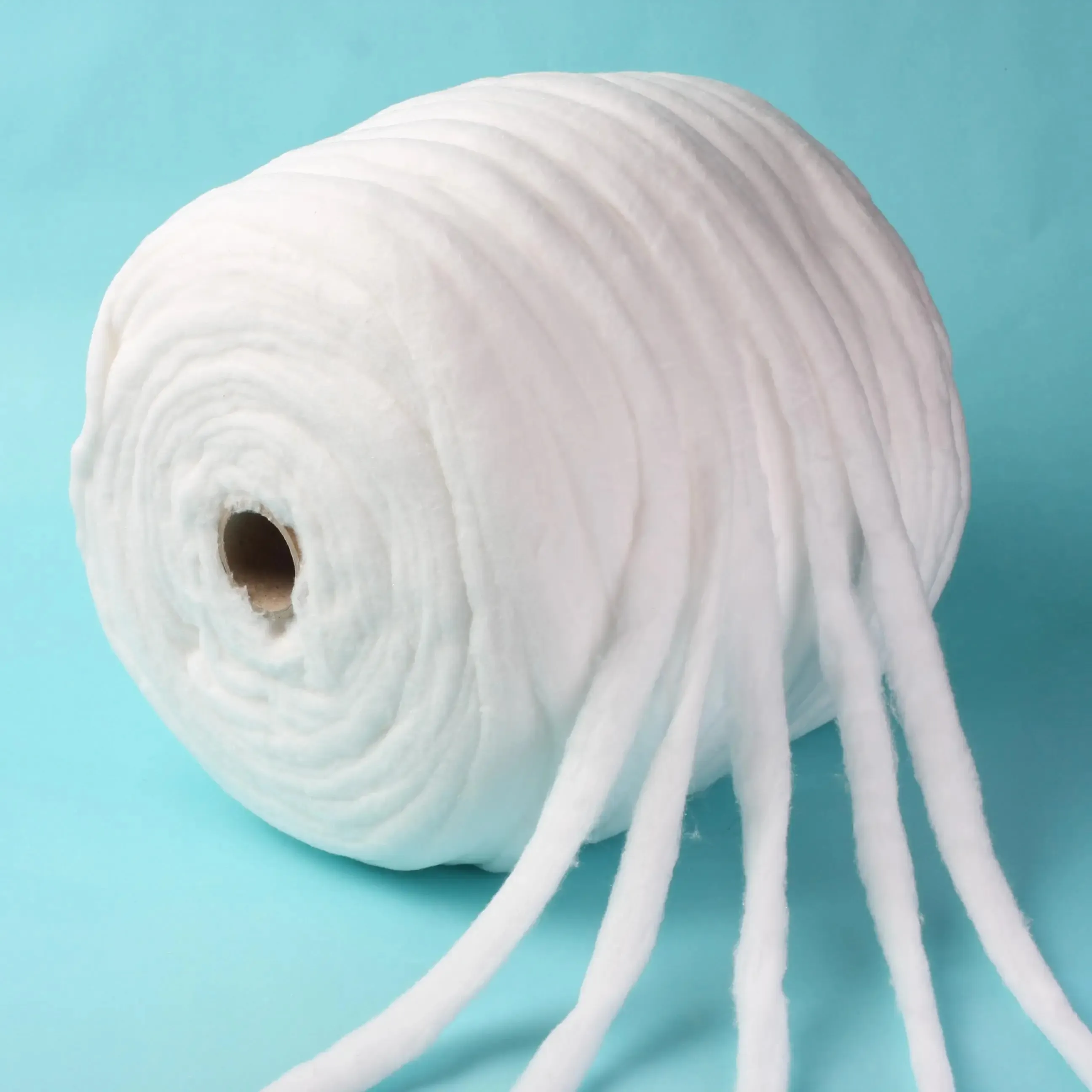 Rolo de lã de algodão absorvente para cuidados pessoais de algodão laminado a quente