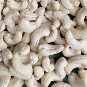 Prix d'usine au Vietnam des noix de cajou W180 Qualité commerciale Santigo Vietnam Usine Client OEM ODM Exigence - Product Image 1