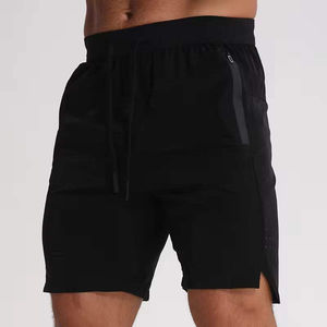 กางเกงขาสั้นออกกำลังกายผู้ชายเอวยางยืด 100% โพลีเอสเตอร์ สีพื้น สไตล์ลำลอง แห้งเร็ว เหมาะสำหรับฟิตเนสและวิ่ง - Product Image 4