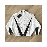 Ensemble de survêtement coupe-vent de haute qualité Ensemble coupe-vent d'été décontracté avec logo personnalisé Survêtement en nylon pour homme Ensemble court coupe-vent
