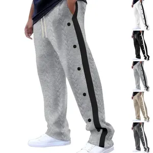 Nuevos pantalones largos texturizados para hombre, pantalones informales holgados de talla grande con un solo botón, pantalones de chándal versátiles, ajuste cómodo - Product Image 1
