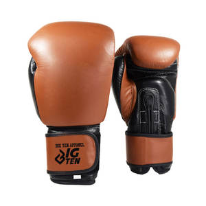 Gants de boxe en cuir de qualité supérieure conçus pour les combattants, les entraîneurs et les athlètes avec rembourrage absorbant les chocs et confort - Product Image 1