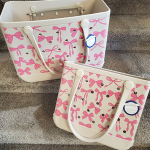Sac fourre-tout de plage en EVA avec logo personnalisé, imprimé nœud rose, imperméable, en caoutchouc perforé, grande capacité, sac à main de shopping pour femmes, vente en gros pour le voyage - Product Image 1