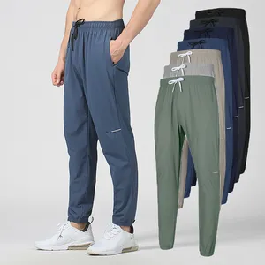 Özelleştirilmiş rahat ince düz renk hafif elastik bel keten pantolon düz bacak pantolon keten pantolon erkekler için