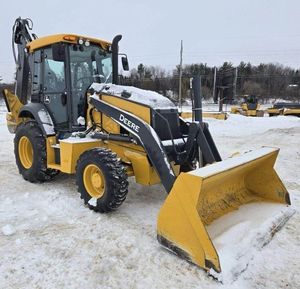 รถตักล้อยาง John Deere 410 P-TIER ดีเซล ปี 2024 พร้อมปั๊ม MOOG ประสิทธิภาพสูง และรถตักล้อยางแบบสกิดสเตียร์ - Product Image 1