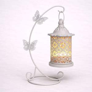 Lanterne suspendue en métal blanc avec support papillon, motif floral ajouré, design élégant, lumière douce, décoration d'intérieur - Product Image 2