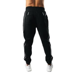 Precio al por mayor personalizado en blanco pista Slim Fit cremallera Jogger pantalón OEM Popular transpirable cómodo hombres Jogger Pantalones - Product Image 4