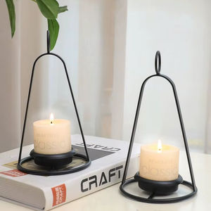 Portavelas de metal negro con brillo dorado, perfecto para Festivales Espirituales, eventos culturales y celebraciones tradicionales - Product Image 1