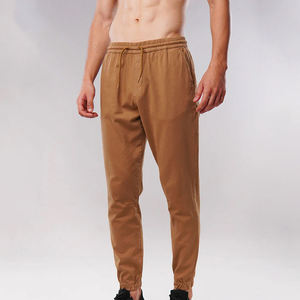 Vente en gros de pantalons de jogging taille haute moyenne en toile 100% coton pour hommes, pantalons de sport colorés avec impression de logo personnalisé - Product Image 6