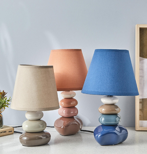 Stacked ceramic pebble table lamps in various colors for the bedside table. Fun accent, available at wholesale prices. - Product Image 1