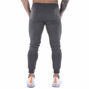 Venta al por mayor de pantalones de hombre antiarrugas liso teñido Casual Joggers pantalones casuales Fitness hombres ropa deportiva pantalones de chándal ajustados - Product Image 2