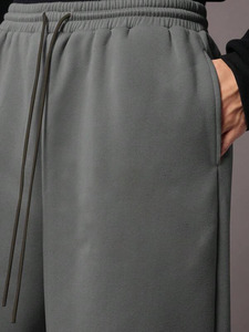 กางเกงวิ่งลำลองผู้ชายสีเทาฟอกขากว้างใส่สบายเอวยางยืดแฟชั่นโอเวอร์ไซส์ - Product Image 5