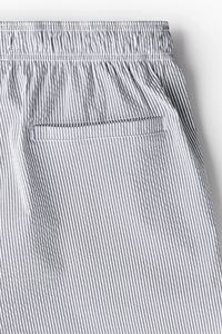 การออกแบบระเหิดราคาขายส่งผู้ชายที่กําหนดเอง Drawstring ไนลอนโพลีเอสเตอร์กีฬากางเกงขาสั้นผู้ชายกางเกงขาสั้นกีฬาชายหาดฤดูร้อน - Product Image 3
