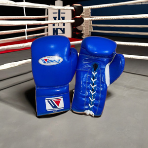 Fabrication OEM de gants de boxe en cuir de qualité supérieure, 100% cuir de vache véritable, à lacets, bleus, gants de boxe Winning - Product Image 1