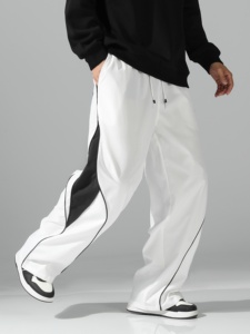 Pantalon de survêtement blanc surdimensionné pour homme, coupe large, avec empiècements latéraux contrastants noirs et détails de passepoil, taille à cordon de serrage – Vente en gros personnalisée - Product Image 6