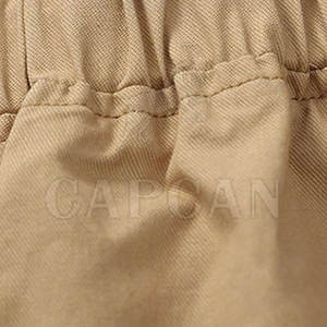 2024กางเกงขาสั้นผ้าฝ้ายใส่สบายสำหรับผู้ชายเอวสูงสไตล์สตรีทดีไซน์สีทึบพร้อมกระเป๋าข้าง2ข้าง - Product Image 3