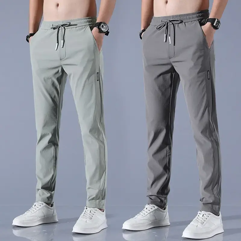 Pantalon extensible à séchage rapide pour hommes pantalon en soie de glace couleur unie taille moyenne pantalon décontracté respirant jambe droite pantalon de sport mince