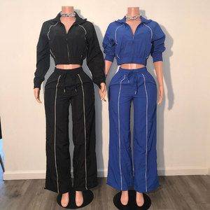 Ensemble deux pièces tendance pour femme : veste courte zippée à manches longues et pantalon ample, survêtement en nylon personnalisable avec logo – Nouveauté fabricant - Product Image 2