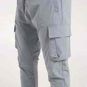 กางเกงคาร์โก้ผ้าฝ้ายแบบลำลองสำหรับผู้ชายกางเกงทรงหลวมเอวยางยืดทรงแบนด้านหน้าสไตล์แฟชั่นดีไซน์ยาวแห้งเร็ว - Product Image 2