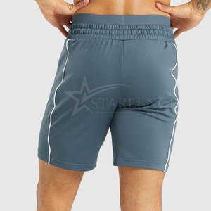 กางเกงขาสั้นออกกำลังกายผ้าฝ้าย100% สำหรับผู้ชายดีไซน์ทึบกางเกงเอวขนาดกลางสำหรับผู้ใหญ่ใหม่ล่าสุด - Product Image 2