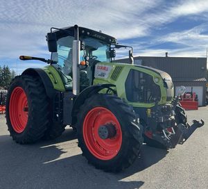 จอยสติ๊กควบคุม CLAAS 850 AXION รถแทรกเตอร์ฟาร์มมือสอง ขับเคลื่อน 4 ล้อ เกียร์อัตโนมัติ เครื่องยนต์และเกียร์บ็อกซ์พร้อมใช้งาน 100% สภาพดีเยี่ยม - Product Image 1