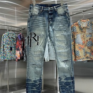 กางเกงยีนส์ผู้ชายเอวสูงรัดรูปเอวกลางกางเกงลำลองแนวสตรีทแบบขาดสติกเกอร์ผ้ายีนส์แบบห้อยผ้าคอตตอนซักสีฟ้าสำหรับฤดูใบไม้ผลิ - Product Image 1