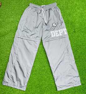 OEM Logo personnalisé Survêtement de jogging en nylon réfléchissant Ensemble de survêtement coupe-vent pour homme Rayures blanches pour homme - Product Image 3