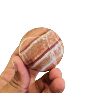 Sphère de grenat de calcite orange en aragonite rose péruvienne naturelle polie, pierre précieuse brune à bandes rares des caraïbes du Pérou - Product Image 1