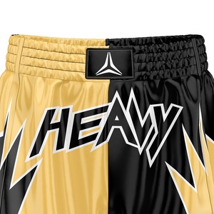 Shorts MMA personnalisés pour hommes, impression par transfert thermique, jaune et noir, satin, logo imprimé, séchage rapide, respirant, léger - Product Image 4