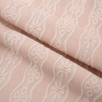 Tissu jacquard tricoté chaîne à texture florale micro-extensible, très demandé, pour robes, hauts, chemises et vêtements de mode féminins