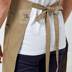 Delantal de algodón cómodo al por mayor delantales de barbero impermeables para hombres y mujeres hechos de tela vaquera y cuero - Product Image 2