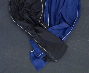 Los pantalones de jogging de nailon personalizados para hombre más vendidos, pantalones impermeables de invierno ligeros OEM - Product Image 4