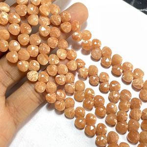 Cuentas de piedras preciosas calibradas en forma de corazón Briolette facetadas de amazonita naranja de 7mm para uso en joyería - Product Image 1