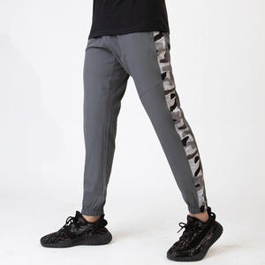 กางเกงผ้าโพลีเอสเตอร์ผ้าสแปนเด็กซ์สำหรับผู้ชายกางเกงลำลองระบายอากาศได้ดีมีซิปดีไซน์แผงลายพราง - Product Image 1