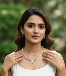 Elegante conjunto de collar y aretes con corte de diamante y diseño floral, con piedras espaciadas uniformemente. - Product Image 1